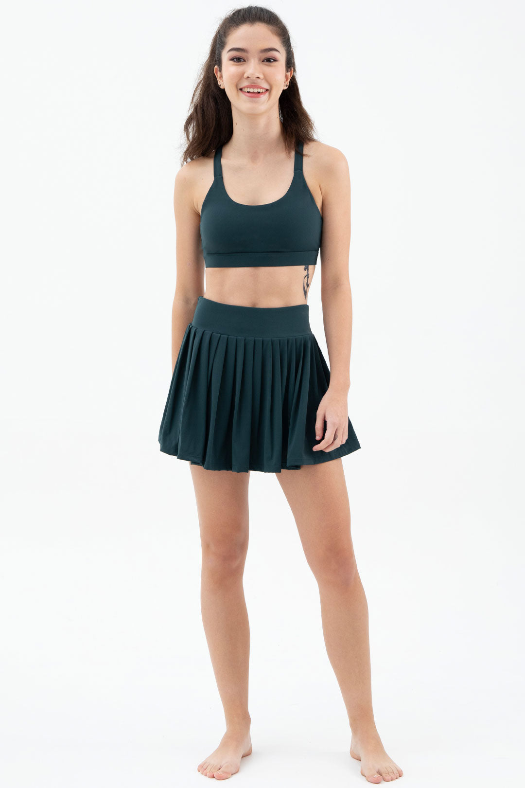 Aces wrap-effect pleated stretch tennis skirt